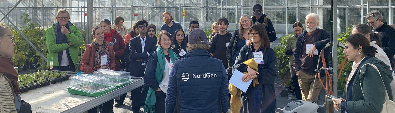 A group of people listening to one person